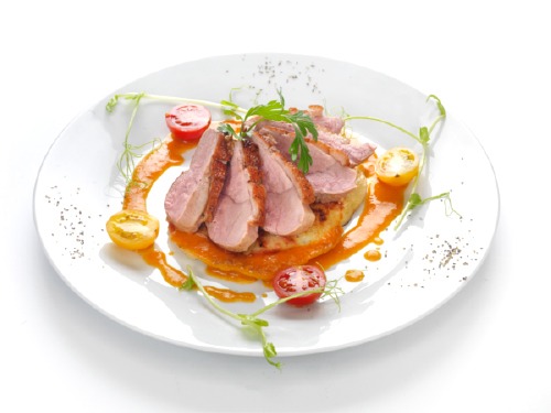 Rosé duck breast aged in thyme, with potato roundel