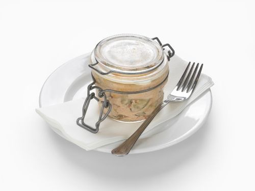 Sour cream cucumber salad in a clamped jar