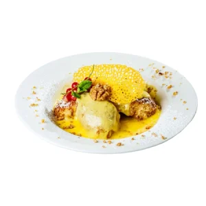 golden dumplings with vanilla sauce