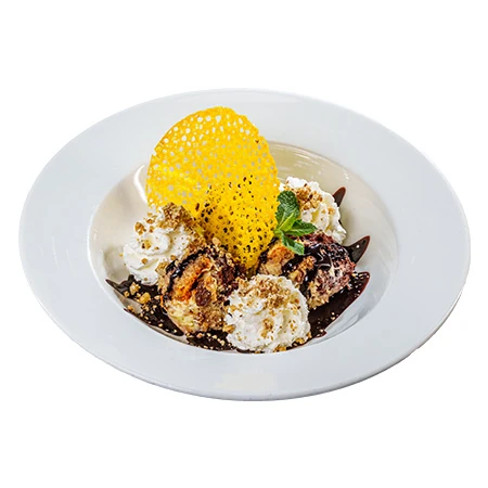 Somlói’ gnocchi (sponge cake with raisins, walnuts, chocolate sauce and whipped cream)