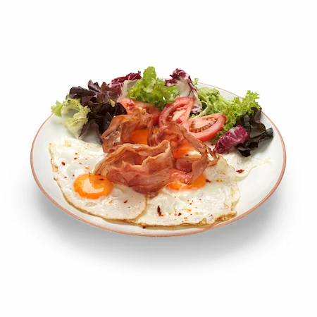 Fried egg with fried bacon